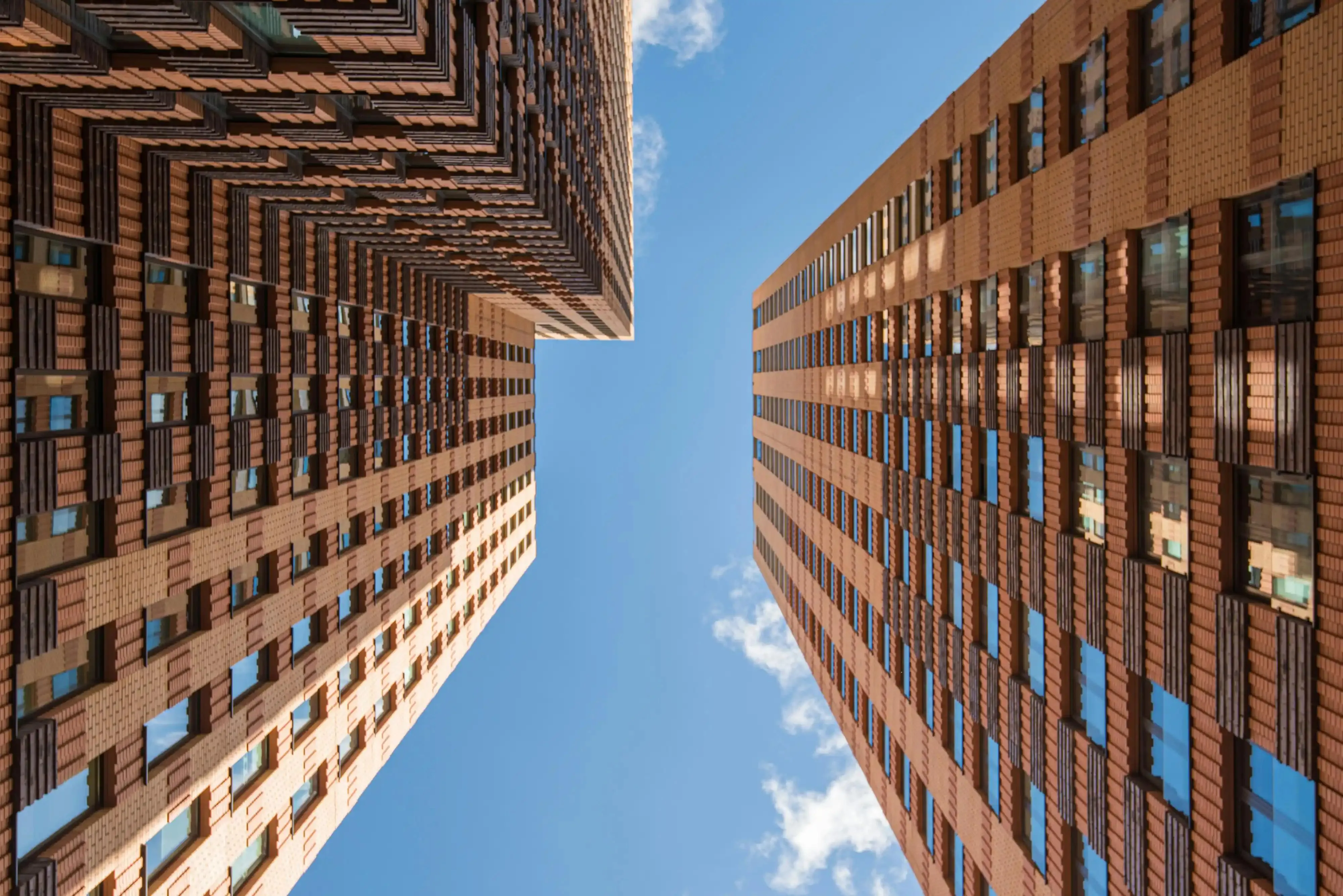 2 buildings in Cape Town taken from the ground facing up to the sky.
