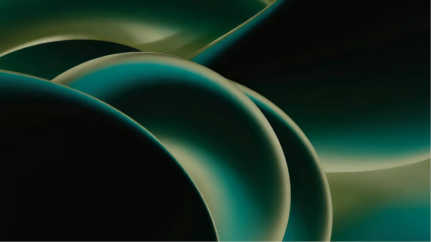 Abstract image of green circular liquid blobs.